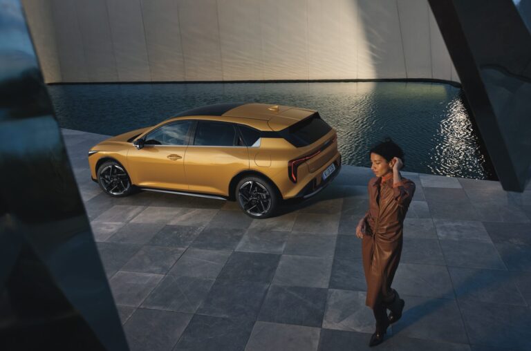 K4_ICE_GTL_MY26_LS_34_Rear_with_Talent_CMYK